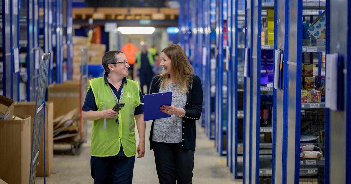 Two people reviewing operations in a warehouse, representing common mistakes first-time importers make