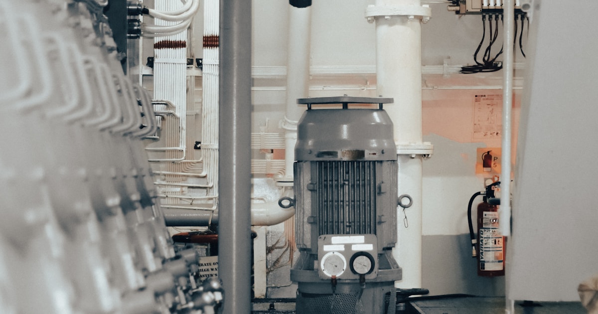 Heavy industrial machinery in a factory, representing importing industrial machinery from China