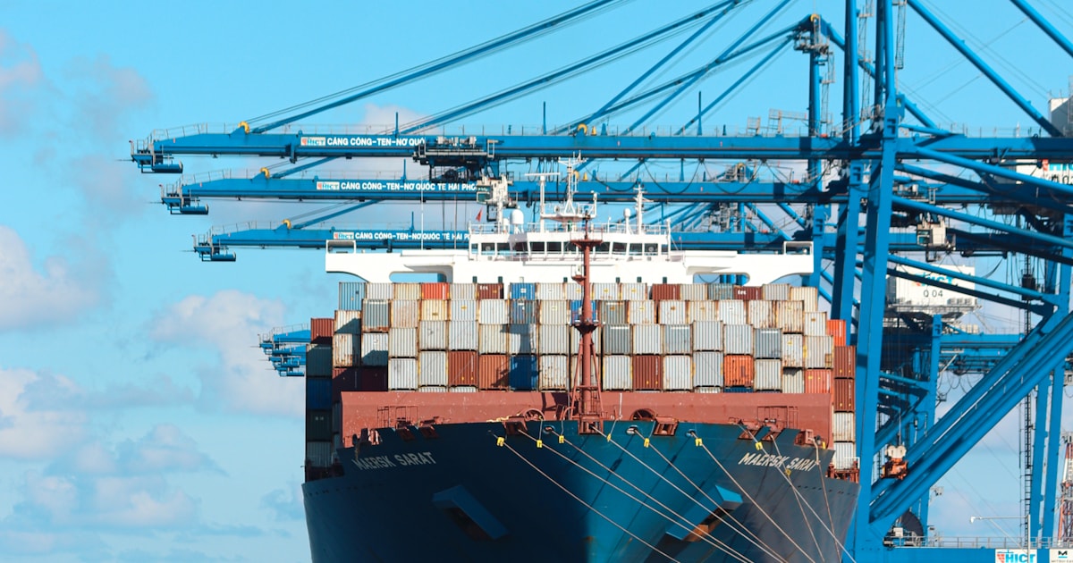 Cargo ship docked at port, representing tips to lower China-to-Bangladesh shipping costs