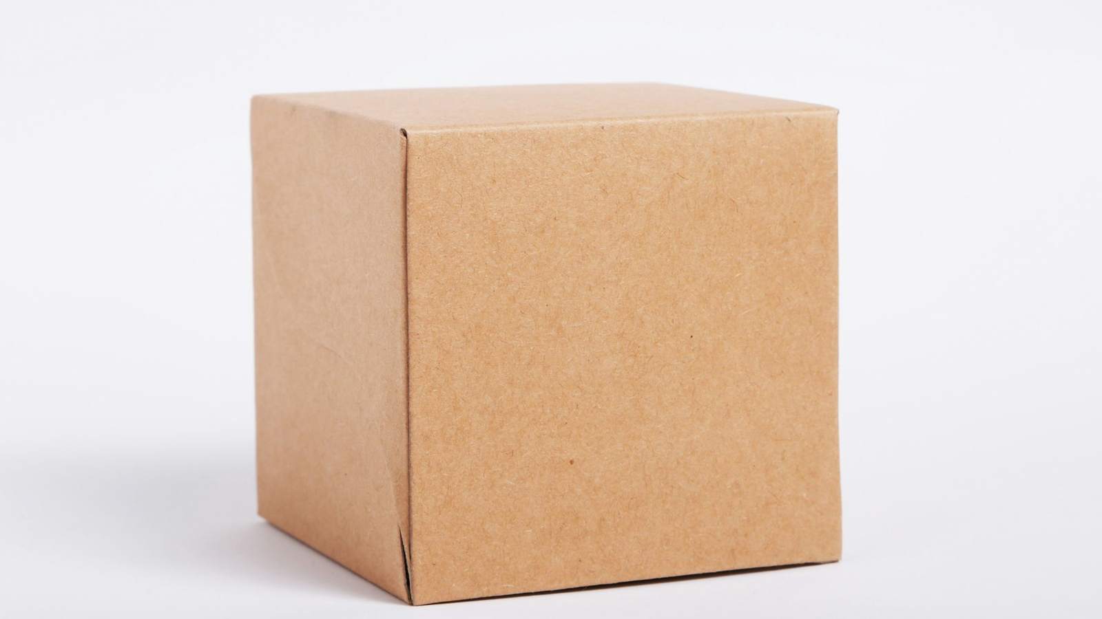 A plain unbranded kraft box on a white background, representing a product before an importer's own brand goes on it